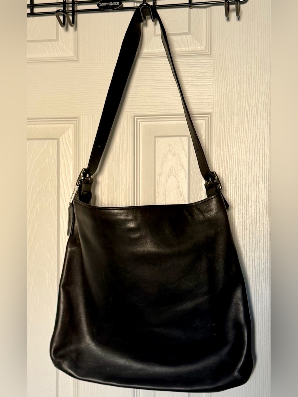 Authentic sleek & sophisticated retired coach purse